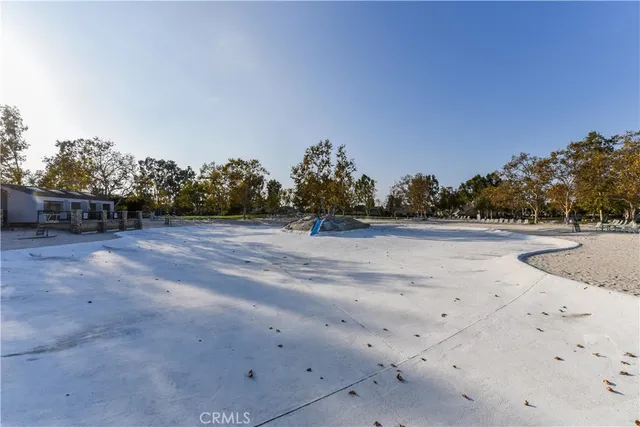 a view of a sign in front of a brick house