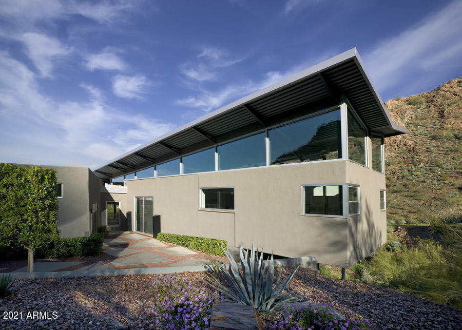 1902 East Mountain View Road Phoenix, AZ 85020 - Photo 5 of 26 a front view of a house with garden