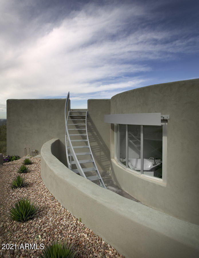 1902 East Mountain View Road Phoenix, AZ 85020 - Photo 7 of 26 a view of a house with a porch