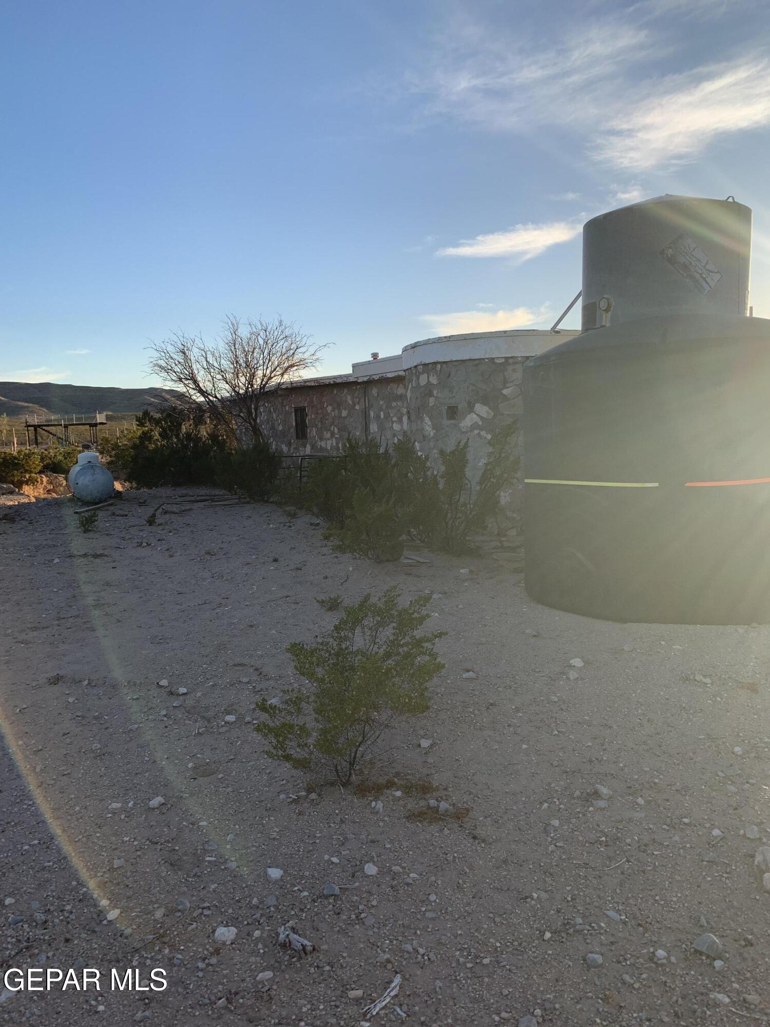 18299 Nolton Road El Paso, TX 79938 - Photo 2 of 7 a view of a dry yard