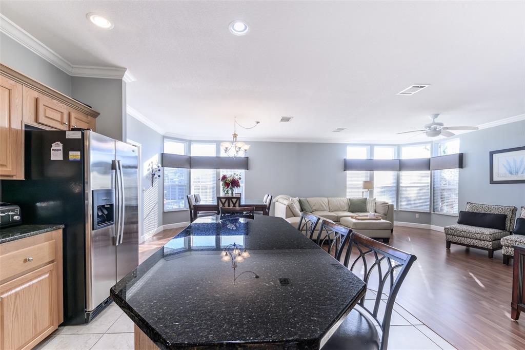 2 Emden Circle Punta Gorda, FL 33950 - Photo 17 of 60 a living room with lots of furniture and a large window