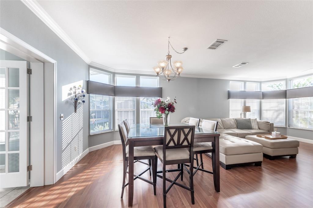 2 Emden Circle Punta Gorda, FL 33950 - Photo 18 of 60 a living room with furniture and a chandelier