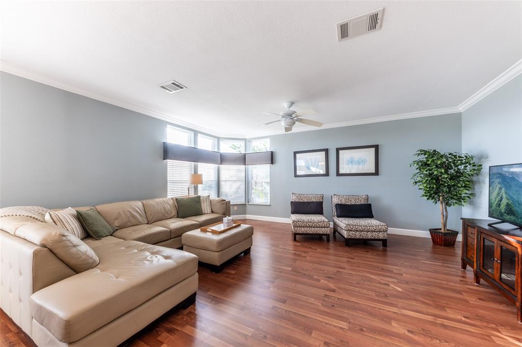 2 Emden Circle Punta Gorda, FL 33950 - Photo 21 of 60 a living room with furniture and a wooden floor