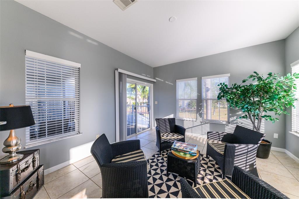 2 Emden Circle Punta Gorda, FL 33950 - Photo 25 of 60 a living room with furniture and a potted plant