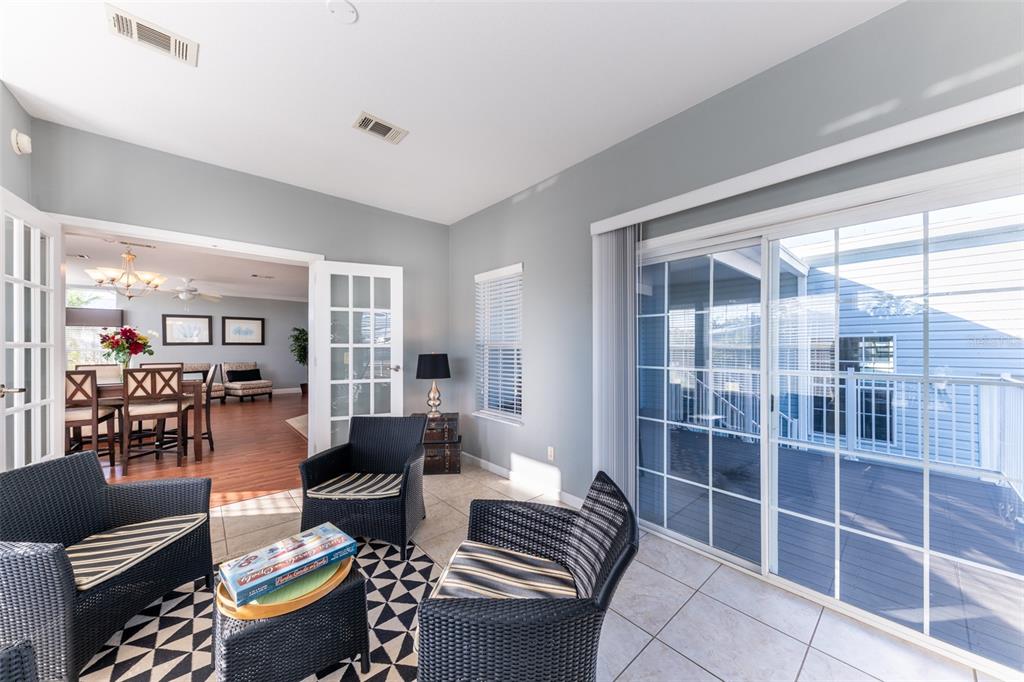 2 Emden Circle Punta Gorda, FL 33950 - Photo 27 of 60 a living room with furniture a rug and a large window