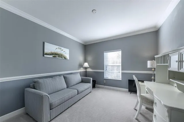 a bedroom with a bed and a walk in closet