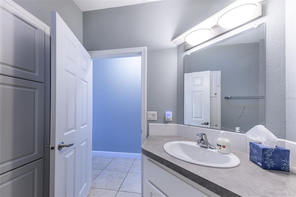 2 Emden Circle Punta Gorda, FL 33950 - Photo 35 of 60 a bathroom with a sink and a mirror