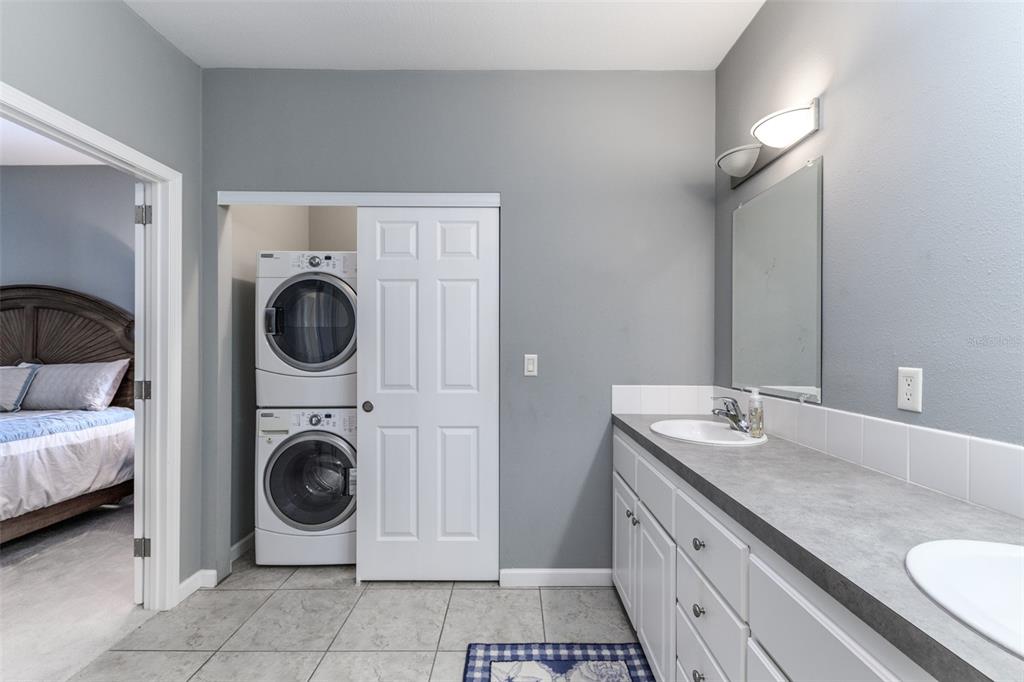 2 Emden Circle Punta Gorda, FL 33950 - Photo 45 of 60 a view of a hallway with washer and dryer