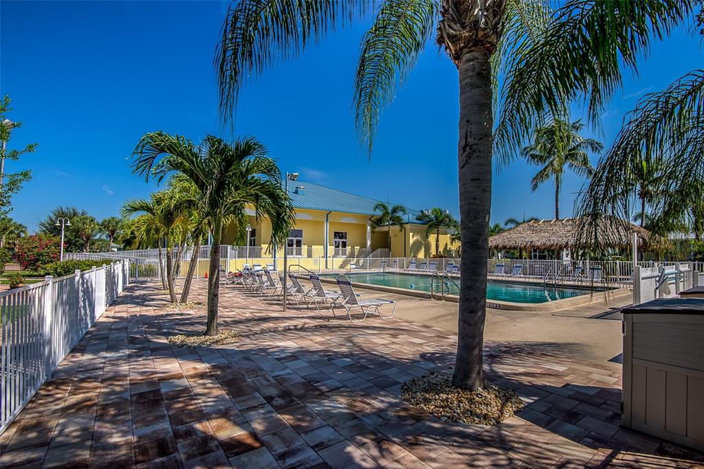 2 Emden Circle Punta Gorda, FL 33950 - Photo 52 of 60 a view of a yard with palm tree