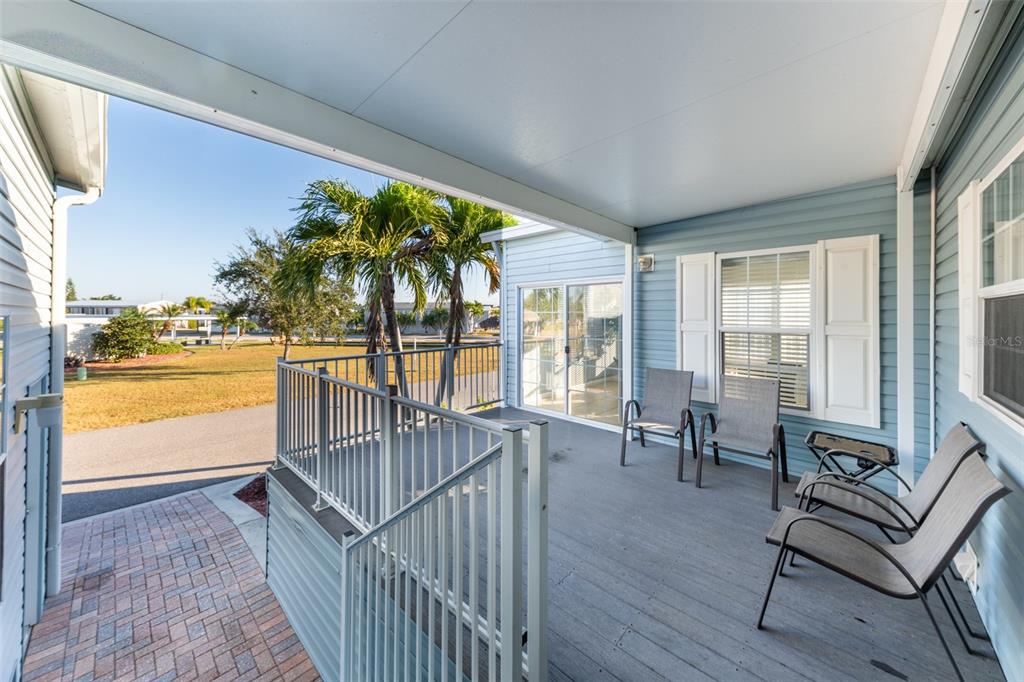 2 Emden Circle Punta Gorda, FL 33950 - Photo 6 of 60 a view of a living room and balcony
