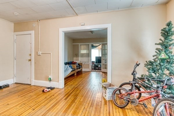 58 Johnson Street Springfield, MA 01108 - Photo 11 of 34 a very nice looking room with a wooden floor