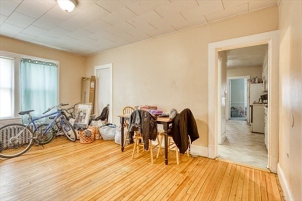58 Johnson Street Springfield, MA 01108 - Photo 12 of 34 a view of a livingroom with furniture and hardwood floor