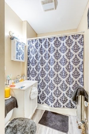 58 Johnson Street Springfield, MA 01108 - Photo 14 of 34 a bathroom with a sink and a bathtub