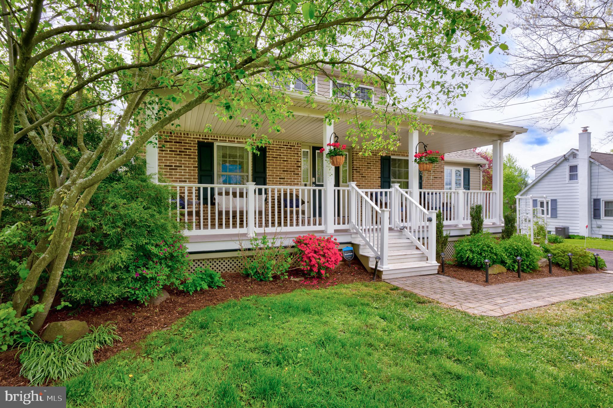 Calming Front Porch Setting, Manicured Landscapes