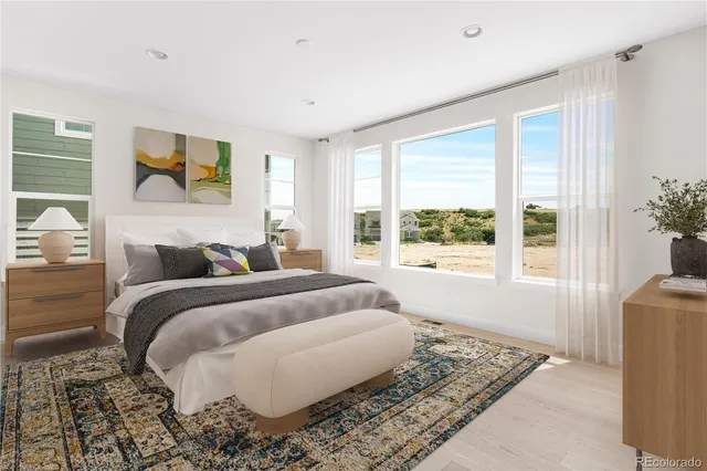 a bed room with a bed and a couch