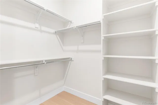 a view of an empty walk in closet