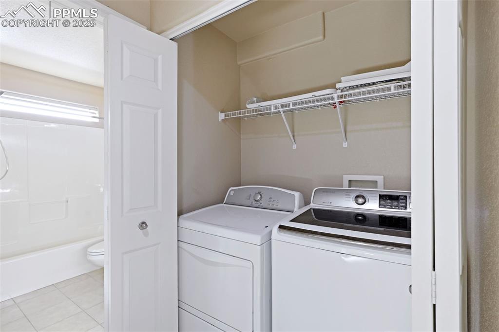 4058 Star View Colorado Springs, CO 80907 - Photo 21 of 43 a utility room with dryer and washer