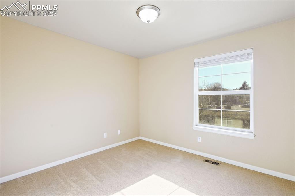 4058 Star View Colorado Springs, CO 80907 - Photo 29 of 41 an empty room with a window