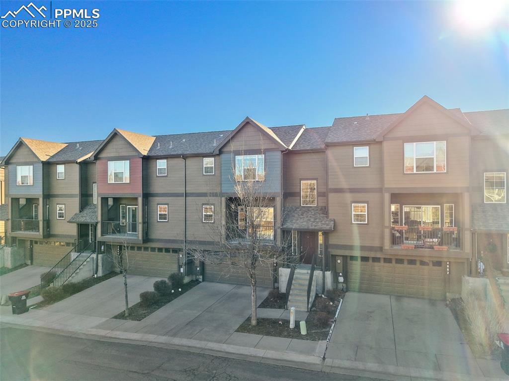 4058 Star View Colorado Springs, CO 80907 - Photo 32 of 41 a front view of a house with a porch