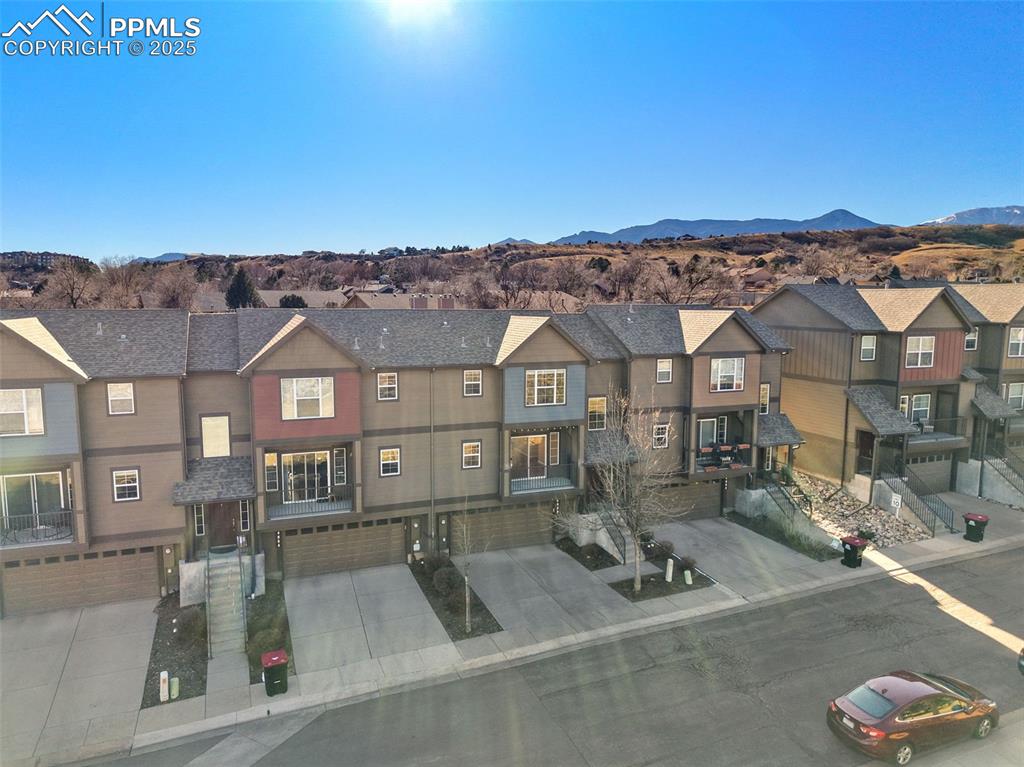 4058 Star View Colorado Springs, CO 80907 - Photo 35 of 43 a view of multiple houses with a street