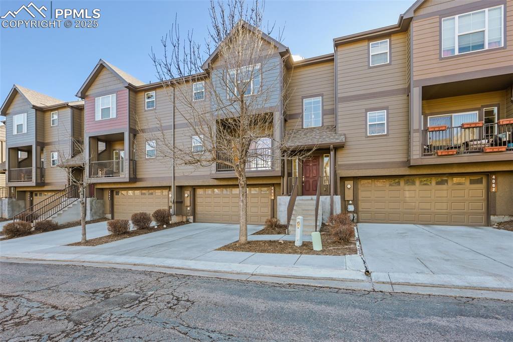 4058 Star View Colorado Springs, CO 80907 - Photo 6 of 43 a building exterior with outdoor seating
