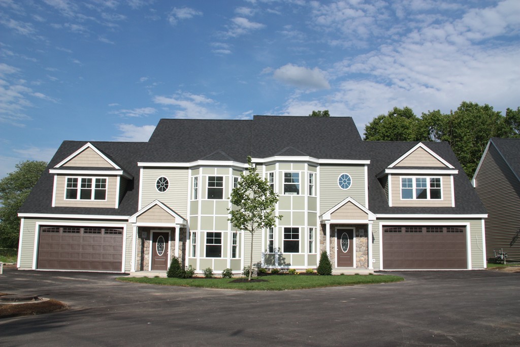 front view of a house with a street