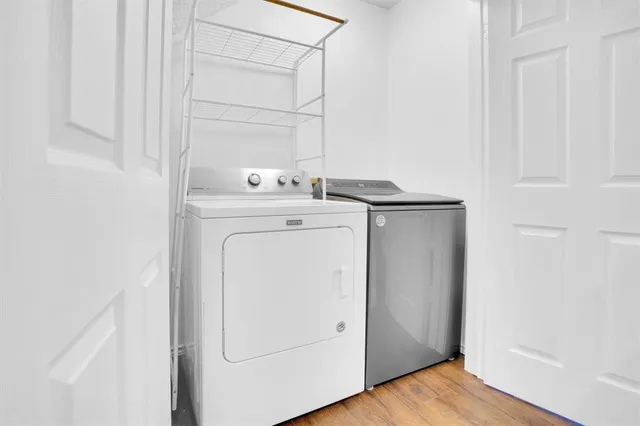 a kitchen with stainless steel appliances granite countertop a sink and a granite counter tops