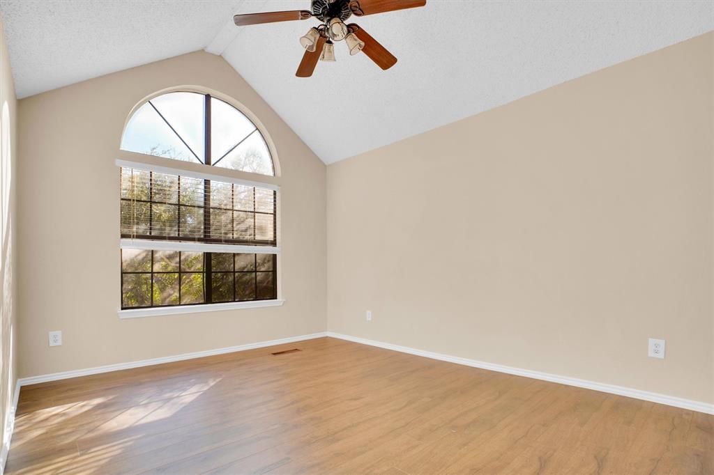 449 Harris Street, Unit I102 Coppell, TX 75019 - Photo 17 of 33 an empty room with a window