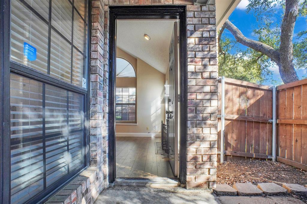 449 Harris Street, Unit I102 Coppell, TX 75019 - Photo 24 of 33 a view of a wooden door of the house