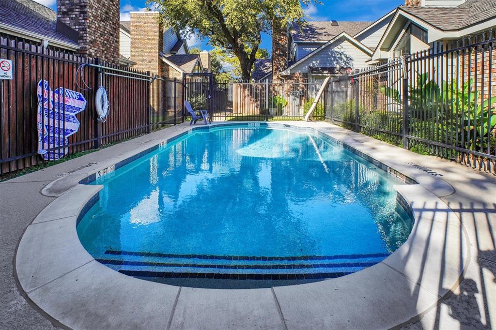 449 Harris Street, Unit I102 Coppell, TX 75019 - Photo 26 of 33 a view of a swimming pool with a patio