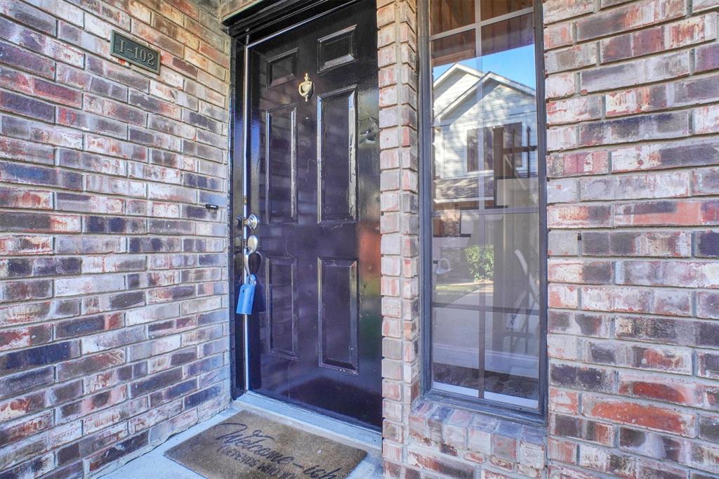 449 Harris Street, Unit I102 Coppell, TX 75019 - Photo 27 of 33 a bathroom with a shower