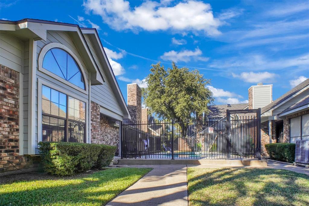 449 Harris Street, Unit I102 Coppell, TX 75019 - Photo 29 of 33 a view of a building with brick walls