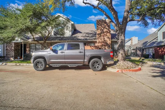 a view of a building with brick walls