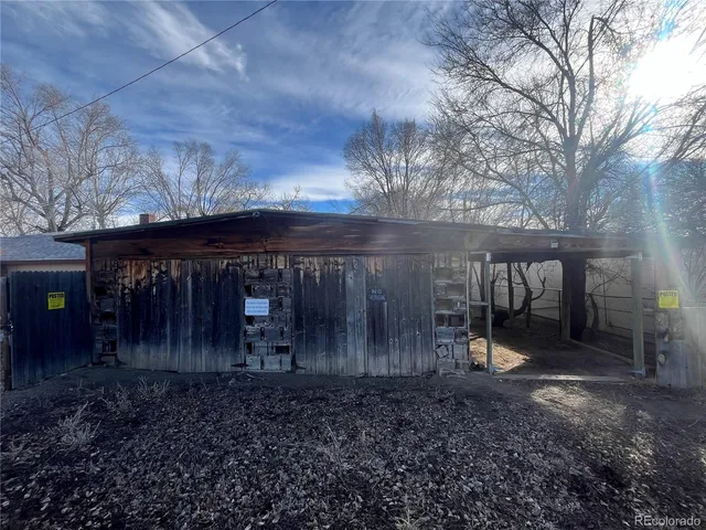 a view of a backyard of the house