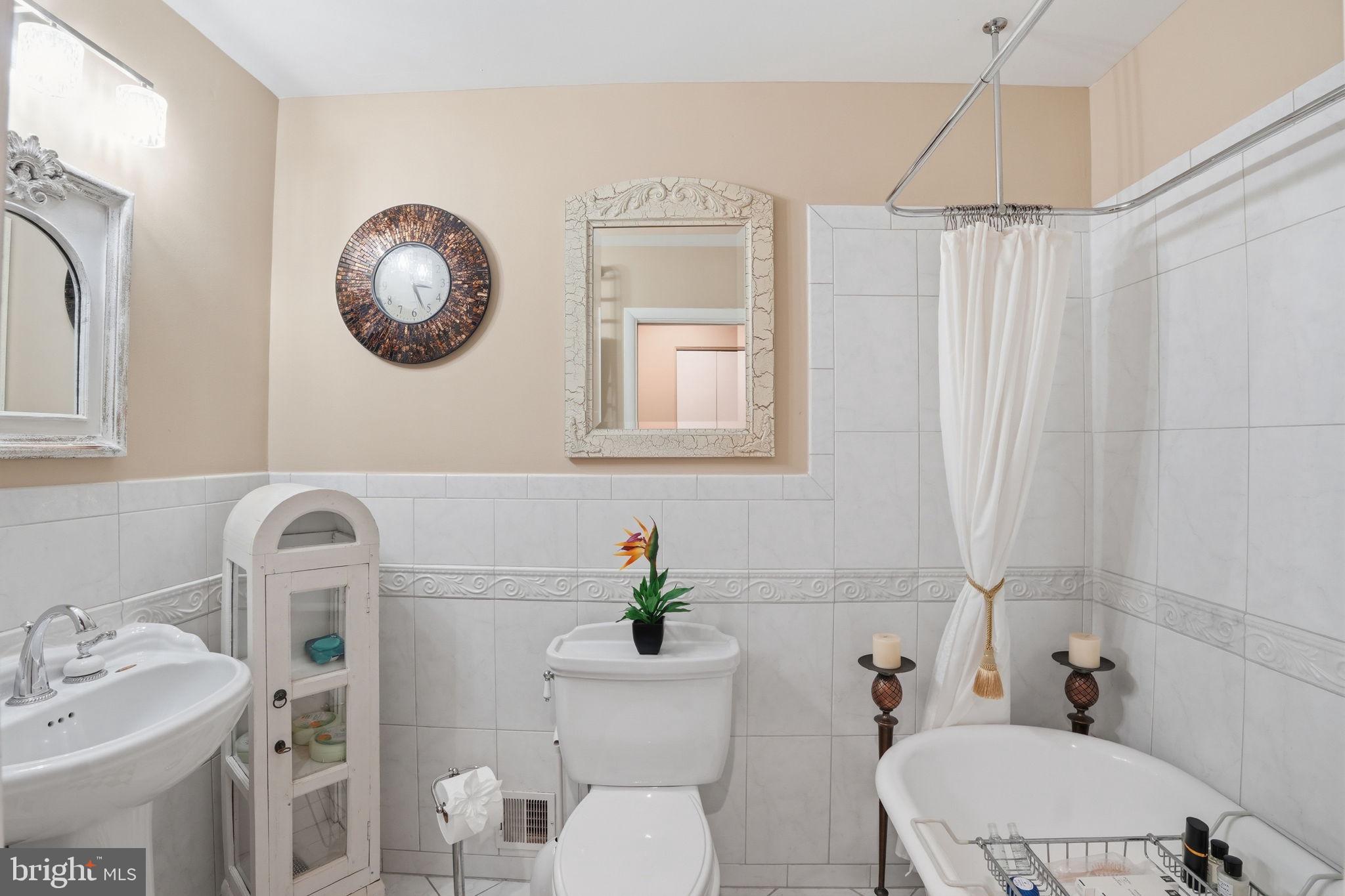 1821 Briggs Road Silver Spring, MD 20906 - Photo 19 of 26 Hall Bathroom