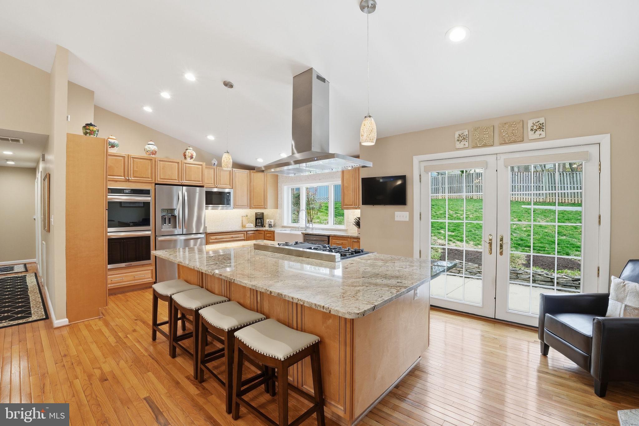 1821 Briggs Road Silver Spring, MD 20906 - Photo 3 of 26 Renovated Kitchen with Center Island