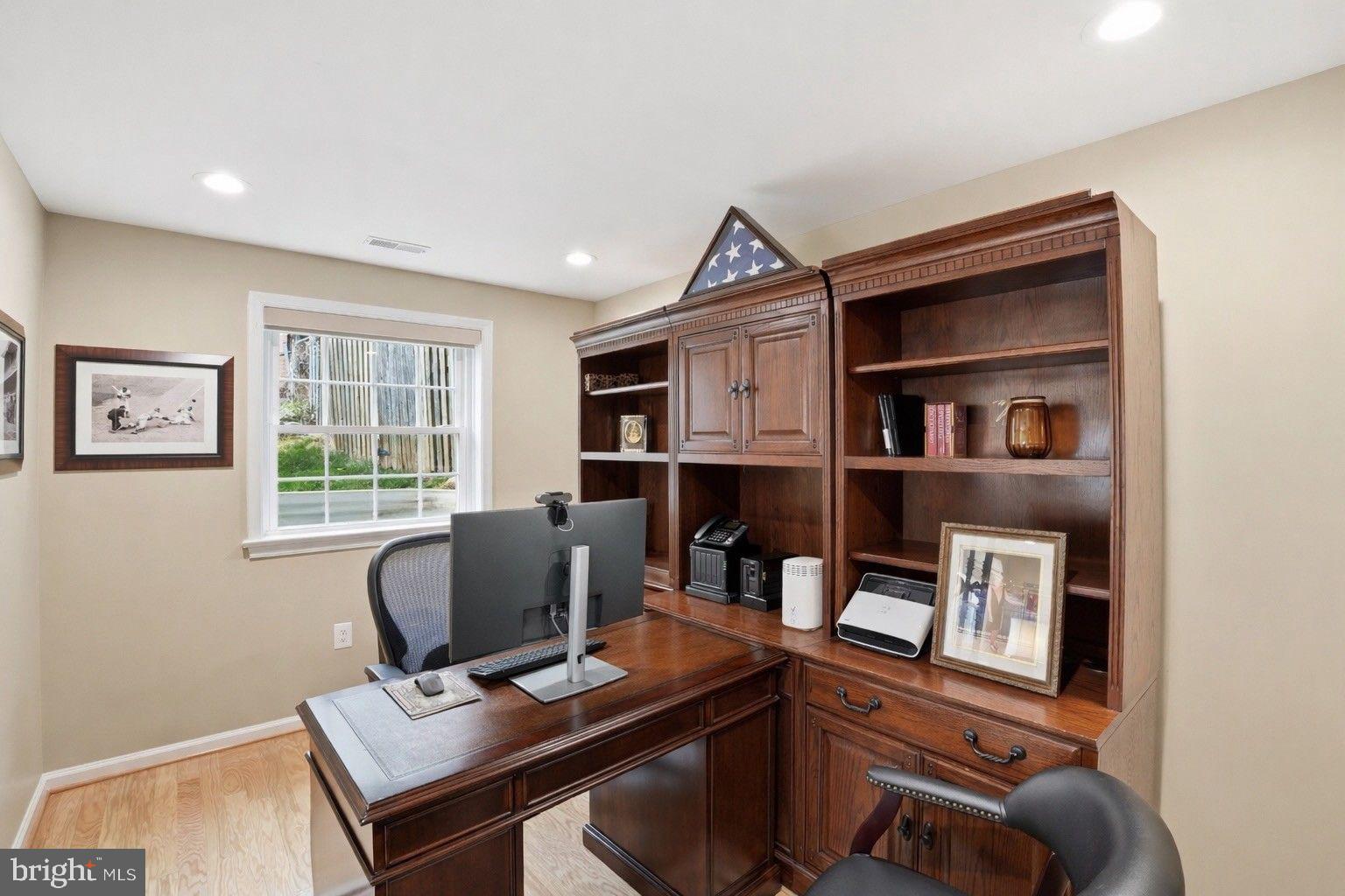 1821 Briggs Road Silver Spring, MD 20906 - Photo 9 of 23 a work room with furniture and a window