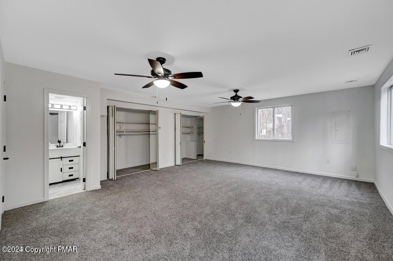113 Java Hill East Stroudsburg, PA 18302 - Photo 22 of 36 an empty room with windows and closet