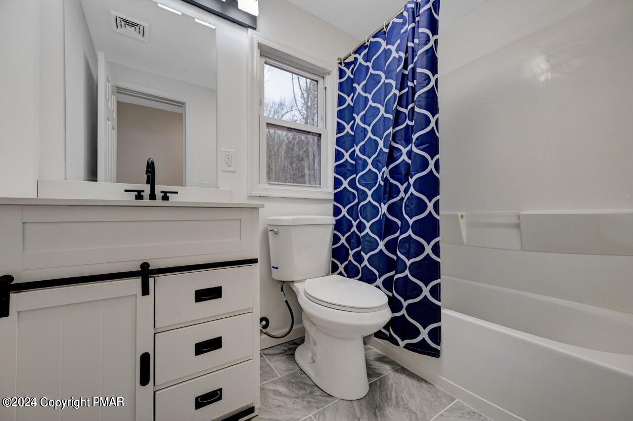 113 Java Hill East Stroudsburg, PA 18302 - Photo 27 of 36 a bathroom with a sink and a toilet