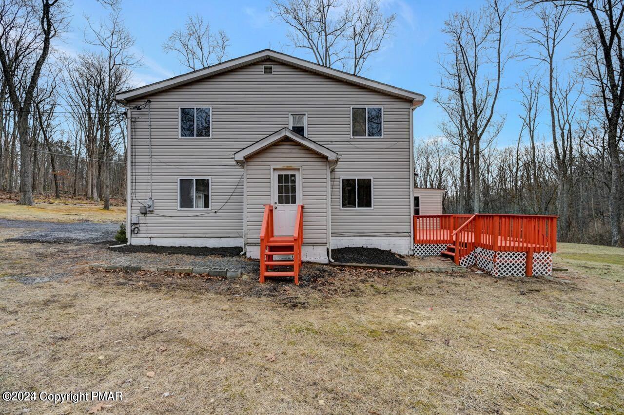 113 Java Hill East Stroudsburg, PA 18302 - Photo 35 of 36 a view of a house with a yard and wooden fence