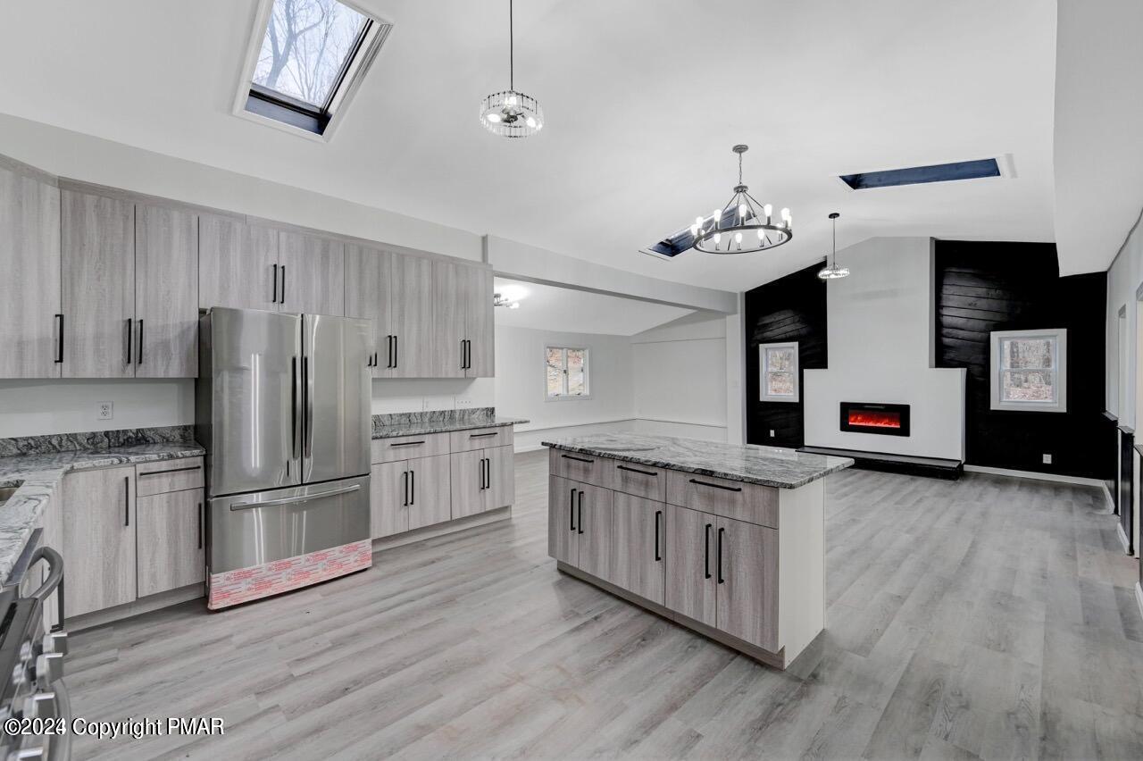 113 Java Hill East Stroudsburg, PA 18302 - Photo 9 of 36 a kitchen with stainless steel appliances granite countertop a sink stove and refrigerator
