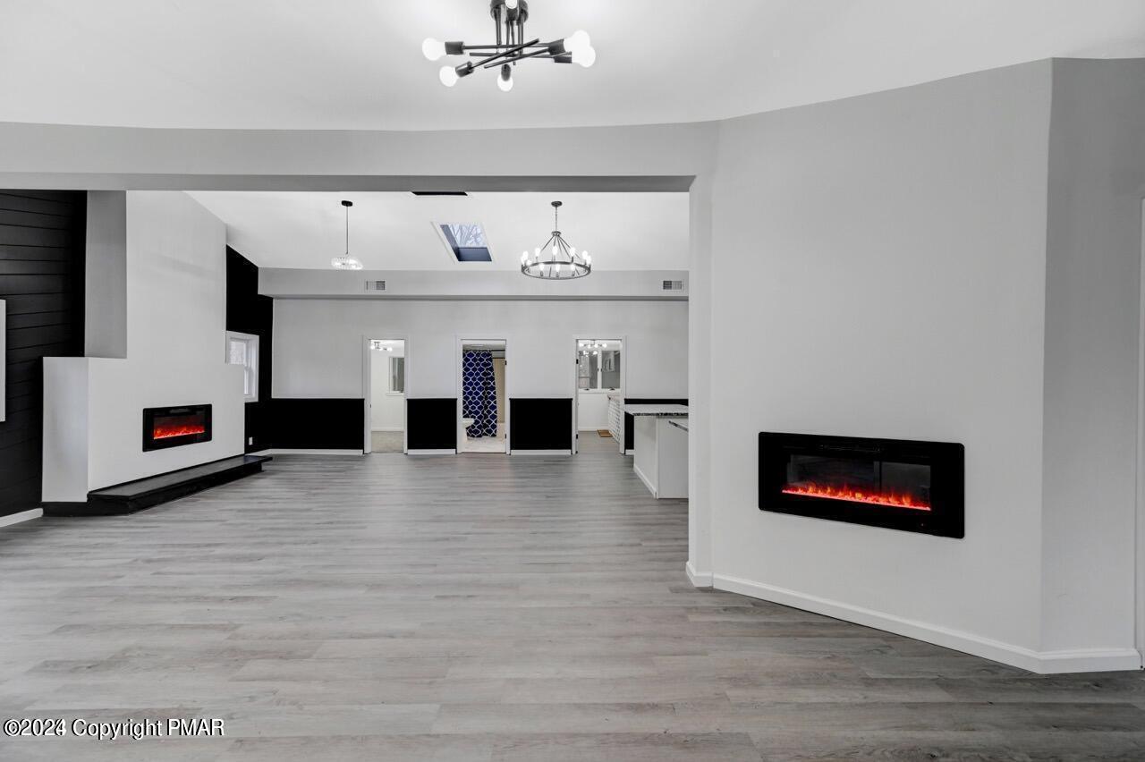 113 Java Hill East Stroudsburg, PA 18302 - Photo 10 of 36 a living room with furniture and a fireplace