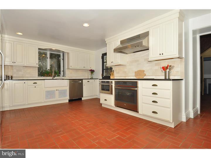 1680 Boot Road West Chester, PA 19380 - Photo 10 of 25 a kitchen with stainless steel appliances cabinets and a window