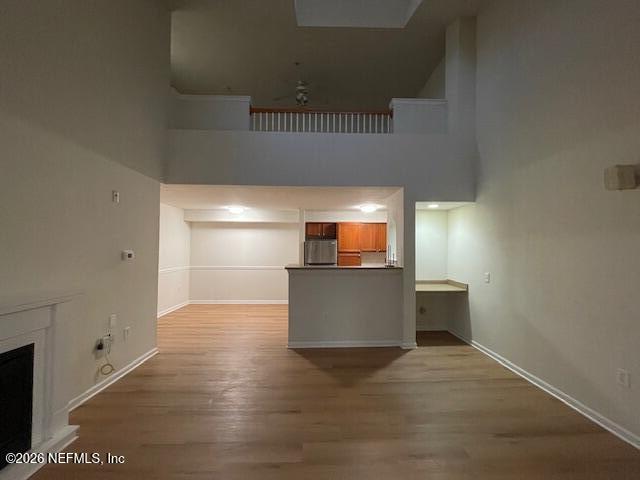 8550 Touchton Road, Unit 1436 Jacksonville, FL 32216 - Photo 11 of 37 a view of a room with wooden floor and a window