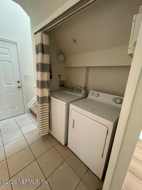 8550 Touchton Road, Unit 1436 Jacksonville, FL 32216 - Photo 15 of 37 a utility room with dryer and washer