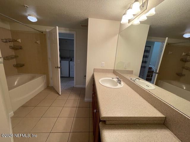 8550 Touchton Road, Unit 1436 Jacksonville, FL 32216 - Photo 17 of 37 a bathroom with a sink a bathtub and a shower