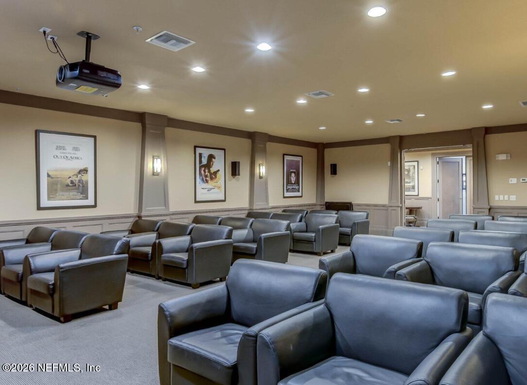 8550 Touchton Road, Unit 1436 Jacksonville, FL 32216 - Photo 33 of 37 a living room with furniture and a large window