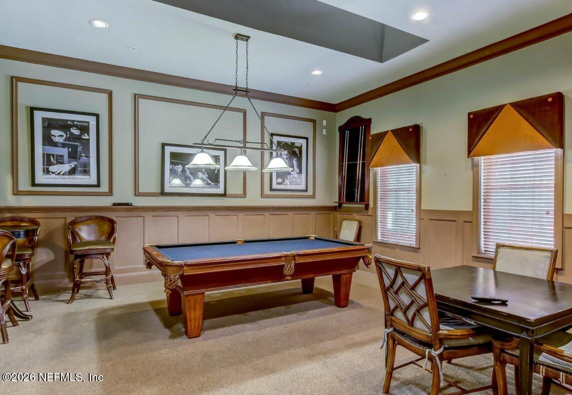 8550 Touchton Road, Unit 1436 Jacksonville, FL 32216 - Photo 35 of 37 a living room with furniture and a window