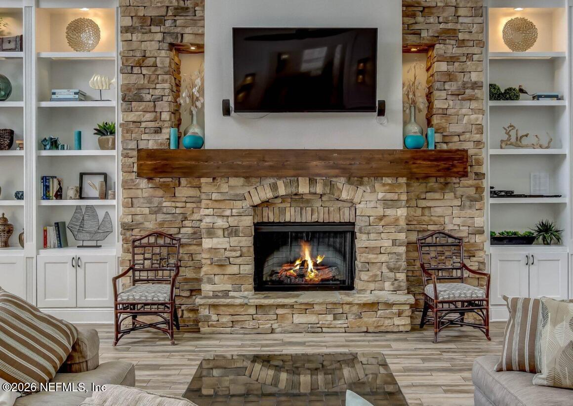 8550 Touchton Road, Unit 1436 Jacksonville, FL 32216 - Photo 36 of 37 a living room with a fireplace