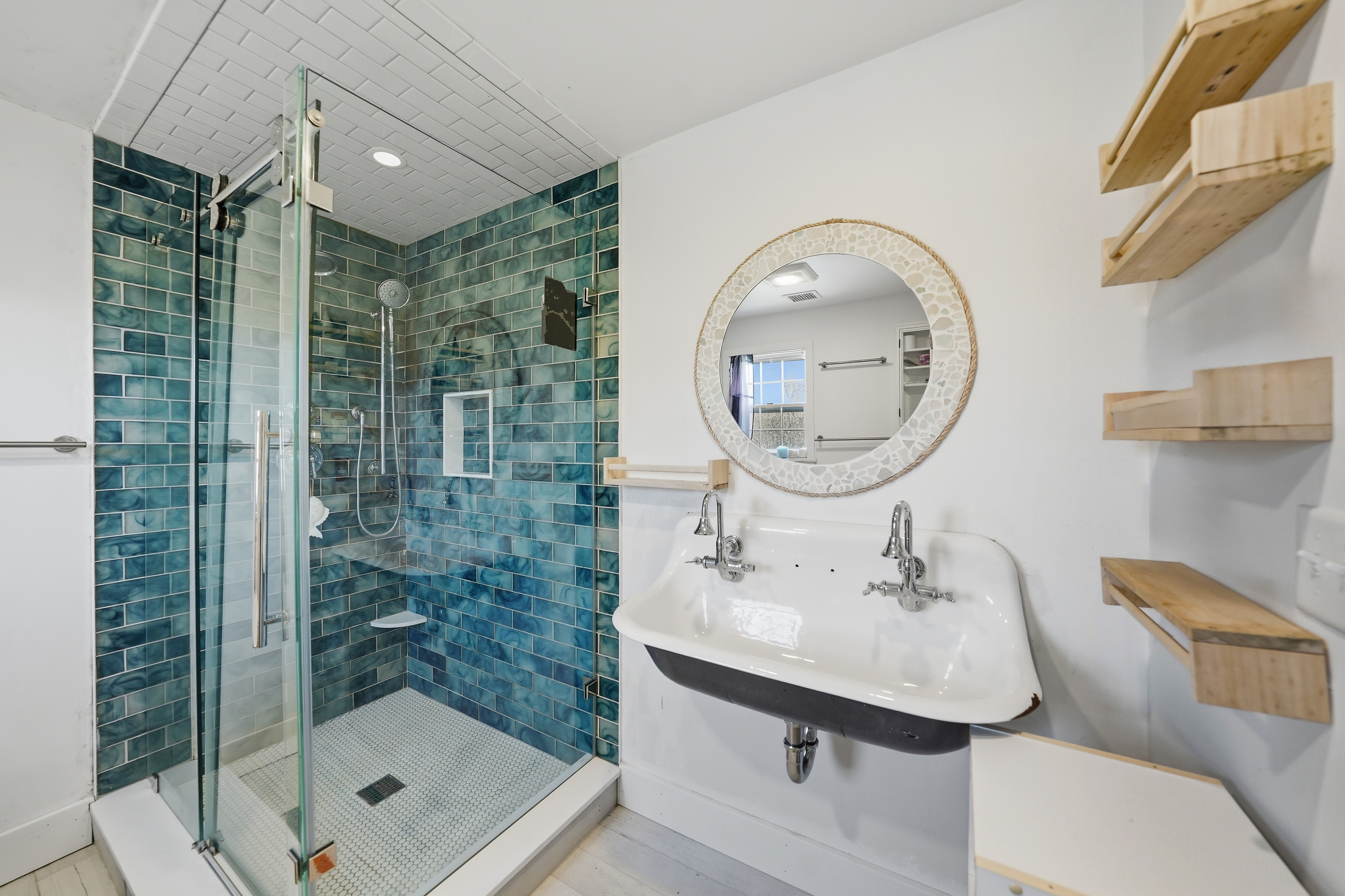 1 H Street Nantucket, MA 02554 - Photo 12 of 18 a bathroom with a sink mirror and shower
